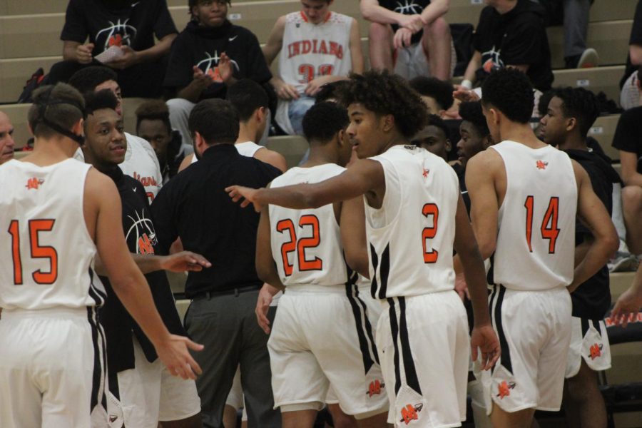 Minooka takes a timeout on Dec. 14 against Oswego.