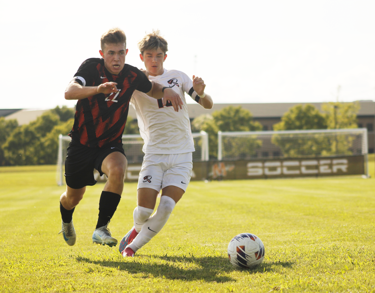 Senior Noah Allen attacks the ball at an early season game against Bradley-Bourbonnais. 