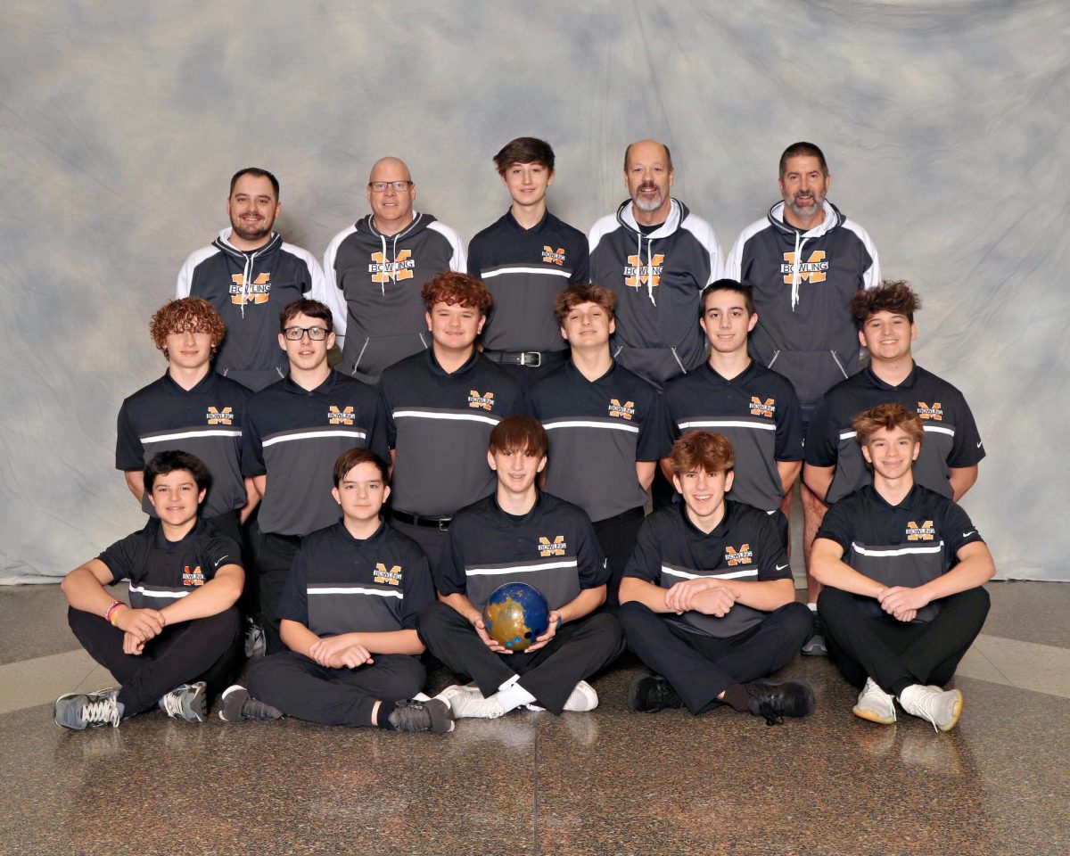 The boys bowling team is coach by Derrick Rapksy.