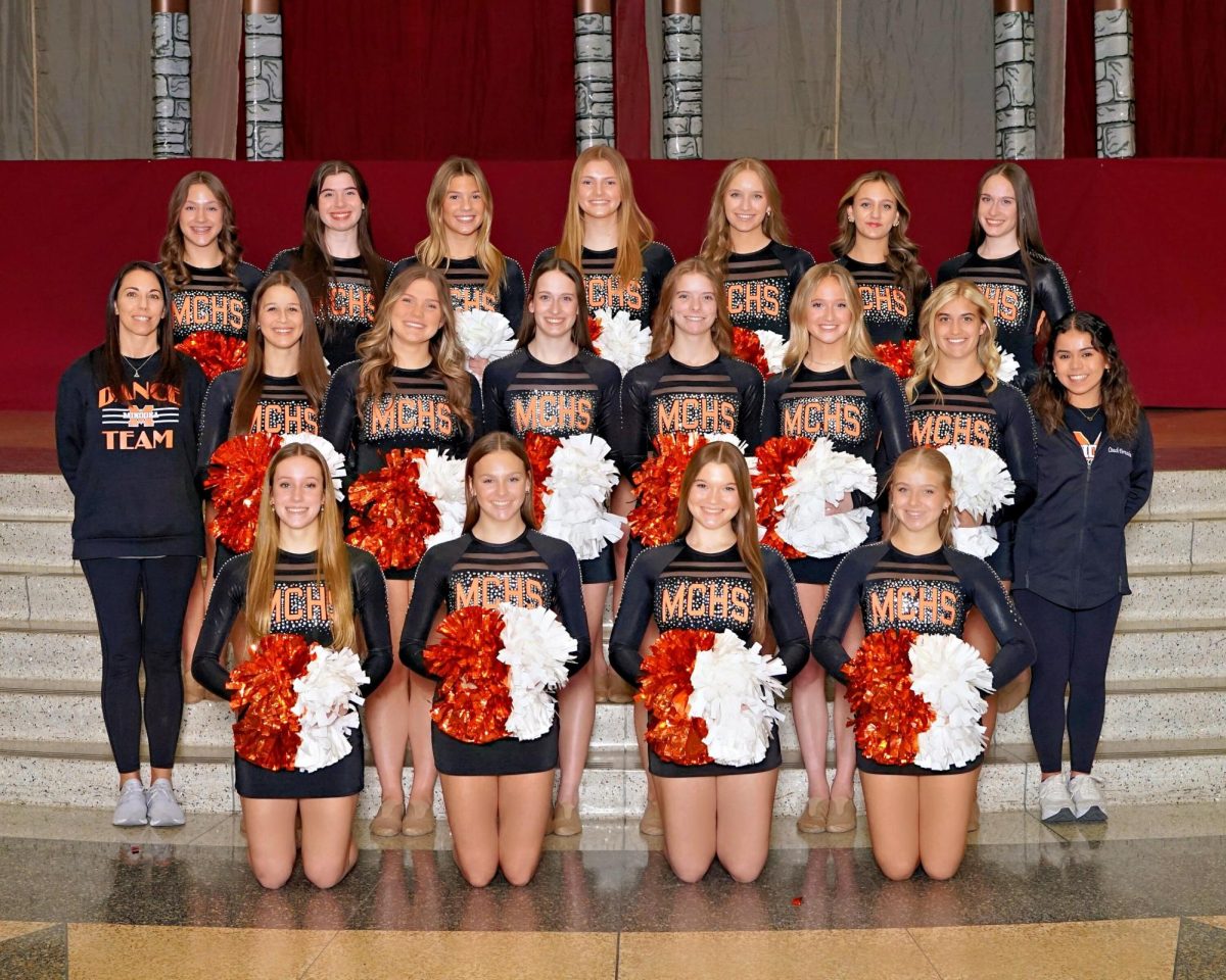 The varsity dance team is coached by Kerri Elkei.