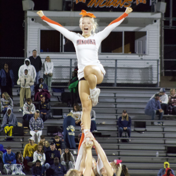 Cheerleaders perform at halftime of the Neuqua Valley football game in the fall of 2024. 